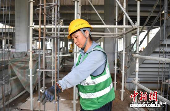 wc200x133_6757589c5b04416f858f33409a54d3c9 图书馆主体结构封顶